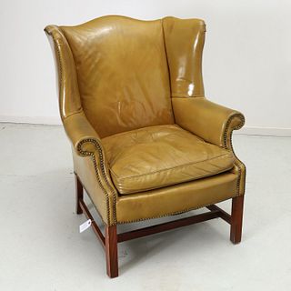 Chippendale style leather wing chair