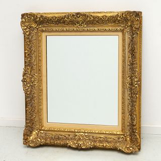 Louis XVI style carved gilt wood and gesso mirror