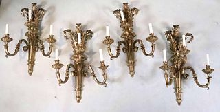 Four Neoclassical Style Three Light Wall Sconces