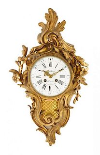 A Louis XV Style Gilt Bronze Cartel Clock, GILBERT FABRE (FRENCH, 19TH/20TH CENTURY), Height 19 1/4 inches.