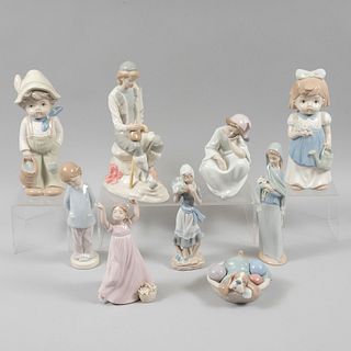 Lote de 9 figuras decorativas. España y Japón, SXX y principios del XXl. Elaboradas en porcelana, algunas Lladró, Nadal