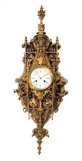 A French Gilt Bronze Cartel Clock, Height 32 inches.
