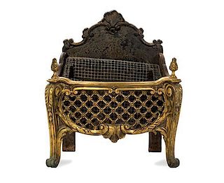 A Louis XV Style Gilt Bronze Fire Grate, EARLY 20TH CENTURY, Height 22 1/4 x width 18 1/2 x depth 11 1/2 inches.