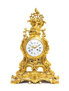 A Louis XV Gilt Bronze Mantel Clock, BERTHOUD, Height 27 inches.