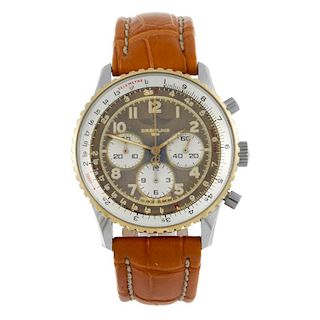 BREITLING - a gentleman's Navitimer chronograph wrist watch. Stainless steel case with yellow metal