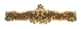 A Pair of Louis XV Style Parcel Gilt Mahogany Valances, Width 62 inches.