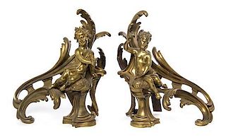 A Pair of Louis XV Style Gilt Bronze Chenets, Height 16 1/2 inches.