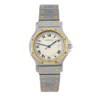 CARTIER - a Santos Ronde bracelet watch. Stainless steel case with yellow metal diamond set bezel. R