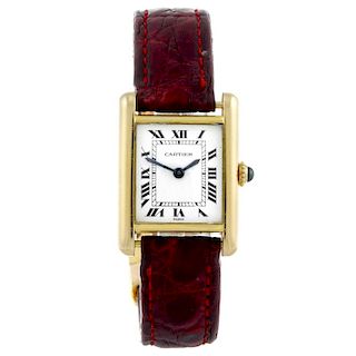 CARTIER - a Tank wrist watch. 18ct yellow gold case. Numbered 7808714027. Signed manual wind movemen