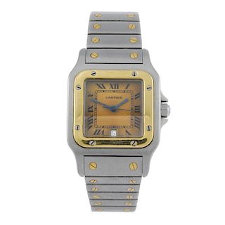 CARTIER - a Santos bracelet watch. Stainless steel case with yellow metal bezel. Reference 187901, s