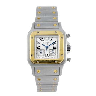 CARTIER - a Santos chronograph bracelet watch. Stainless steel case with yellow metal bezel. Referen