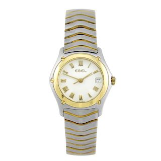 EBEL - a lady's Classic Wave bracelet watch. Stainless steel case with yellow metal bezel. Reference