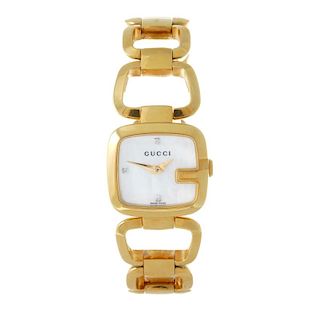 GUCCI - a lady's 125.5 bracelet watch. Rose gold plated case. Numbered 13337301. Signed quartz movem