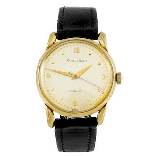 IWC - a gentleman's wrist watch. 18ct yellow gold case, import hallmarked London 1952. Signed automa