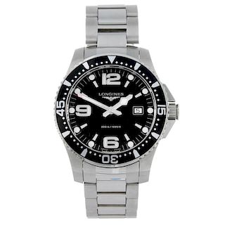 LONGINES - a gentleman's Hydro Conquest bracelet watch. Stainless steel case with calibrated bezel.