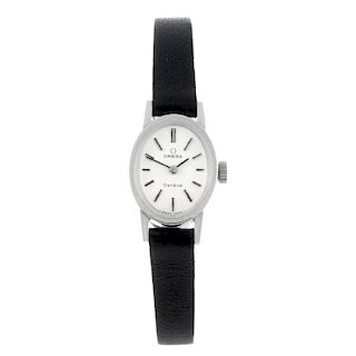 OMEGA - a lady's Gen_ve wrist watch. Stainless steel case. Numbered 511.363. Signed manual wind cali