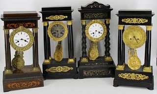 4 Antique Column Form Clocks.