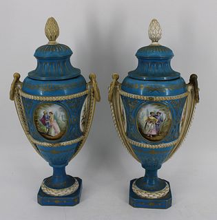 A Pair Of Sevres Powder Blue Porcelain Lidded