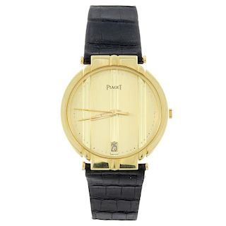 PIAGET - a gentleman's Polo wrist watch. Yellow metal case, stamped 750 with poincon. Numbered 34673
