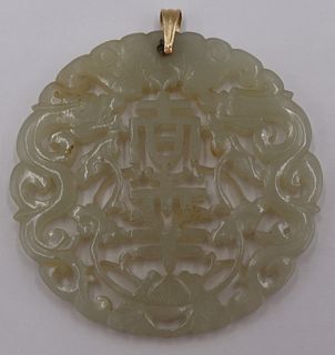 JEWELRY. Carved Celadon Jade Pendant.