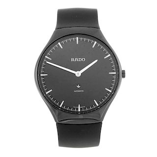 RADO - a gentleman's Thinline wrist watch. Ceramic case with stainless steel case back. Reference 62