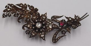 JEWELRY. Antique Diamond and Ruby Floral Brooch.