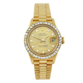 ROLEX - a lady's Oyster Perpetual Datejust bracelet watch. Circa 1987. 18ct yellow gold case with di