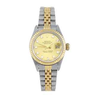 ROLEX - a lady's Oyster Perpetual Datejust bracelet watch. Circa 1991. Stainless steel case with yel