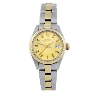 ROLEX - a lady's Oyster Perpetual Datejust bracelet watch. Circa 1980. Stainless steel case with yel