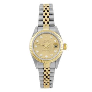 ROLEX - a lady's Oyster Perpetual Datejust bracelet watch. Circa 2002. Stainless steel case with yel