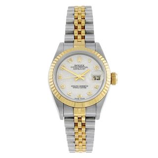 ROLEX - a lady's Oyster Perpetual Datejust bracelet watch. Circa 1996. Stainless steel case with yel