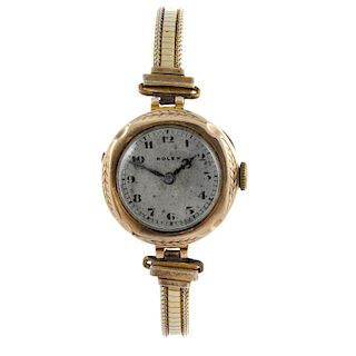 ROLEX - a lady's bracelet watch. 9ct yellow gold case with presentation inscription to rear, import