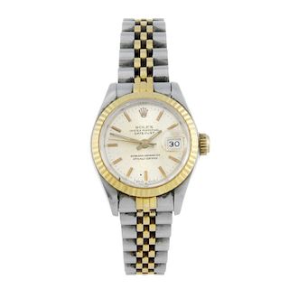 ROLEX - a lady's Oyster Perpetual Datejust bracelet watch. Circa 1987. Stainless steel case with yel