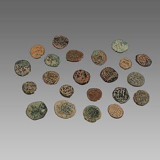 Lot of 22 Islamic Bronze coins. 