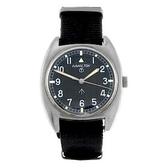 HAMILTON - a gentleman's military issue wrist watch. Stainless steel case, stamped with British Broa