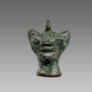 Ancient Bronze head of Pazuzu amulet.