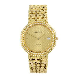 BASKANIA - a gentleman's bracelet watch. Factory diamond set yellow metal case, stamped 0,750. Unsig