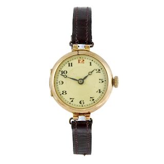 A lady's wrist watch. 9ct yellow gold case, import hallmarked London 1920. Unsigned manual wind move