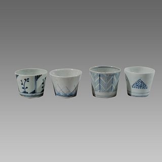 Lot of 4 Antique Chinese blue and white cermaic cups. 