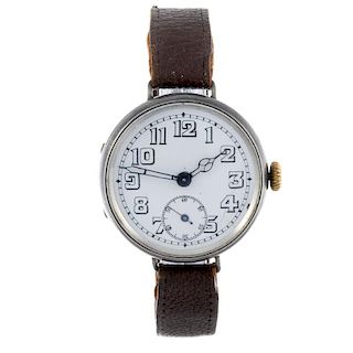 A gentleman's trench style wrist watch. Silver case, import hallmarked London 1915. Unsigned manual