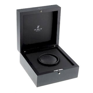 HUBLOT - a complete watch box. <br><br>Outer case appears in a poor condition, corners are ripped. I