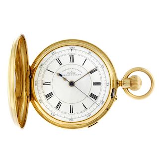 A full hunter centre seconds pocket watch. 18ct yellow gold case with engraved monogram to case back
