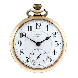 An open face pocket watch by Illinois Central. Gold plated case. Number 11352974. Signed keyless win