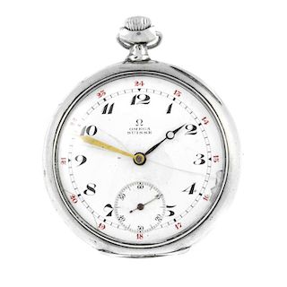 An open face pocket watch by Omega. White metal case. Number 6389352. Signed keyless wind movement w