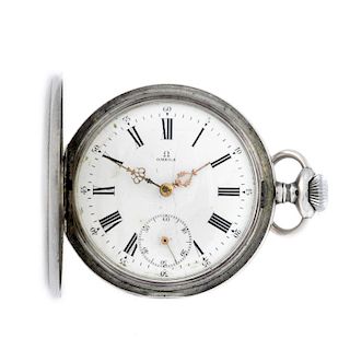 A full hunter pocket watch by Omega. White metal case. Number 4380743. Signed keyless wind movement
