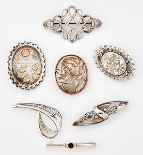 A GROUP OF SEVEN SILVER BROOCHES, comprising AN OLA M. GORI