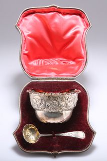 A VICTORIAN SILVER BOWL AND SIFTING SPOON, by William Gibso