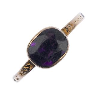 A late Georgian gold amethyst memorial ring. Designed as a collet-set foil back amethyst to the engr