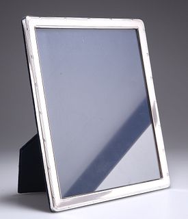 AN ELIZABETH II SILVER PHOTOGRAPH FRAME, by Carr's of Sheff