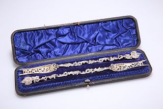 A PAIR OF VICTORIAN SILVER PICKLE FORKS, by William Comyns 
